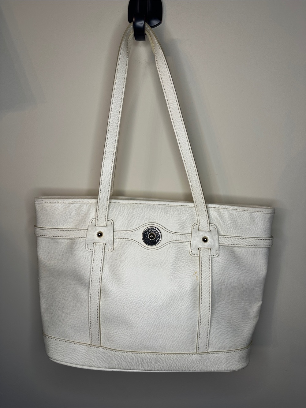 White Leather Tote with Center Medallion Dooney and Bourke.